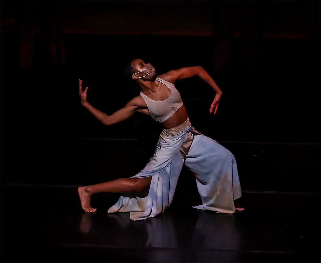 A ChiArts student dancing in an elaborate pose.